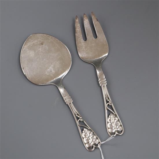 A pair of Danish Georg Jensen sterling leaf and berry pattern servers, no.71, largest 18cm.